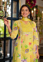 Gorgeous yellow cotton suit paired with organza dupatta