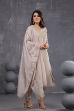 Beautiful muslin embroidered suit paired with soft orgenzadigital printed dupatta