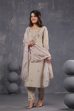 Beautiful muslin embroidered suit paired with soft orgenzadigital printed dupatta