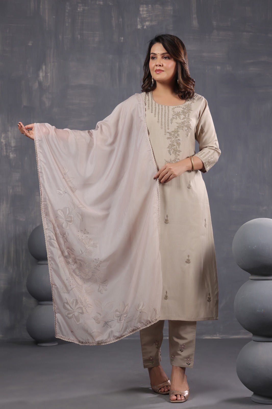 Beautiful muslin embroidered suit paired with soft orgenzadigital printed dupatta