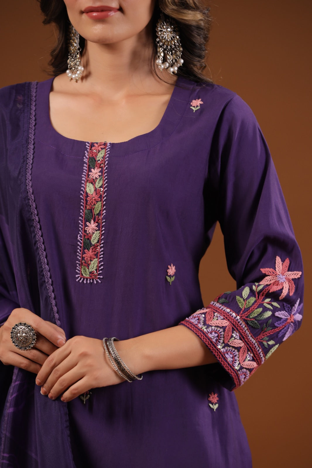 Premium muslinfully embroidered with designer back paired with a soft orgenza dupatta with lace detailing