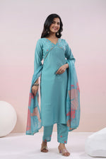 Muslin embroidery suit set paired with organza dupatta