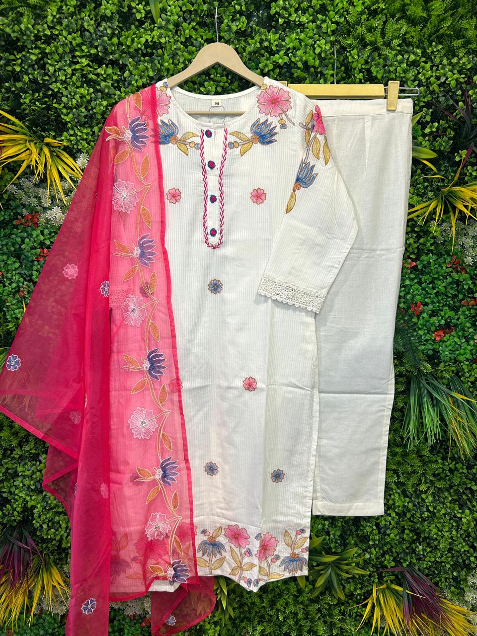 Beautiful jacquard cotton suit set paired with organza dupatta