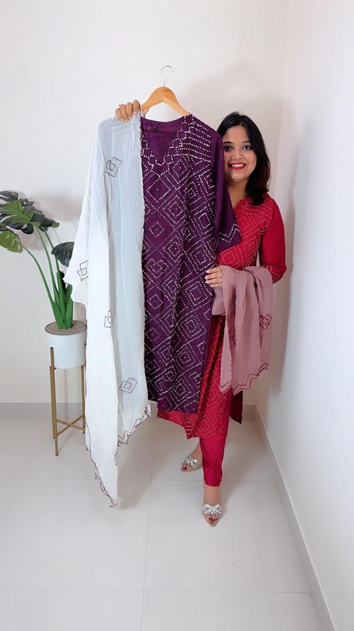 Heavy dola silk githan work kurta lang paired with organza dupatta in wine