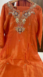 Premium shimmer tissue zari detailing suit set in orange