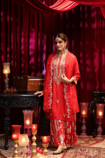 Premium silk heavy embroidered kurta paired with georgette