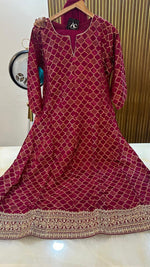 Premium banarsi silk with full zari detailing all over