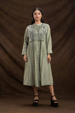 Muslin embroidered one piece dress in green