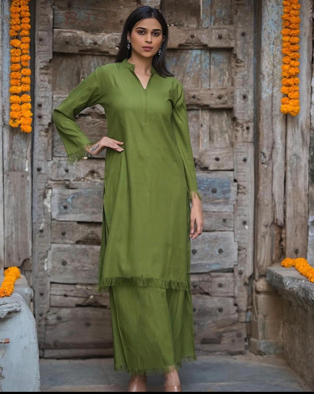 Beautiful cotton co ord set with fringes detailing in kurtapaired with beautiful culottes in green