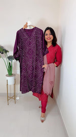 Heavy dola silk githan work kurta lang paired with organza dupatta in wine